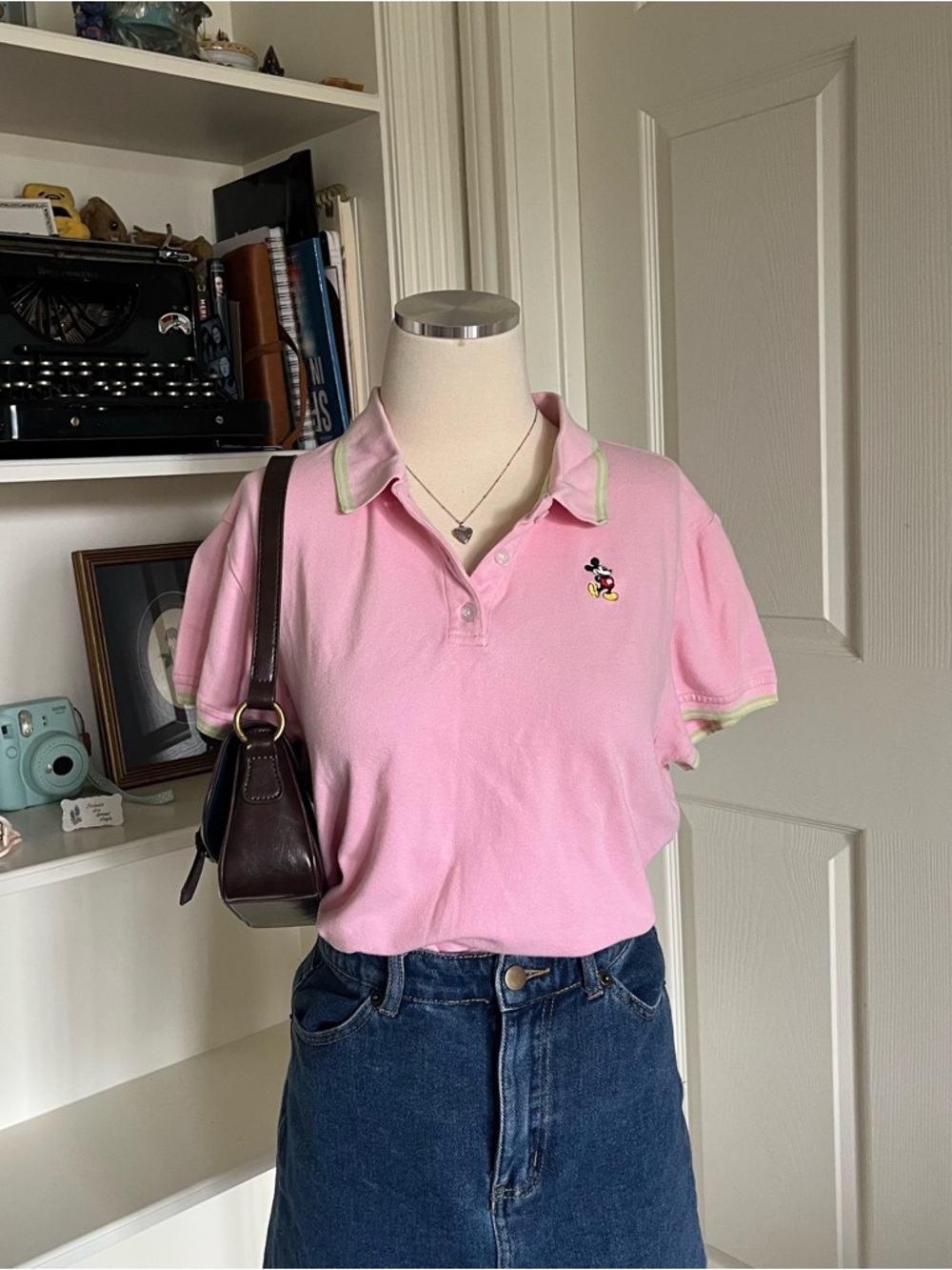Disney light Pink Mickey Mouse polo shirt with green accents